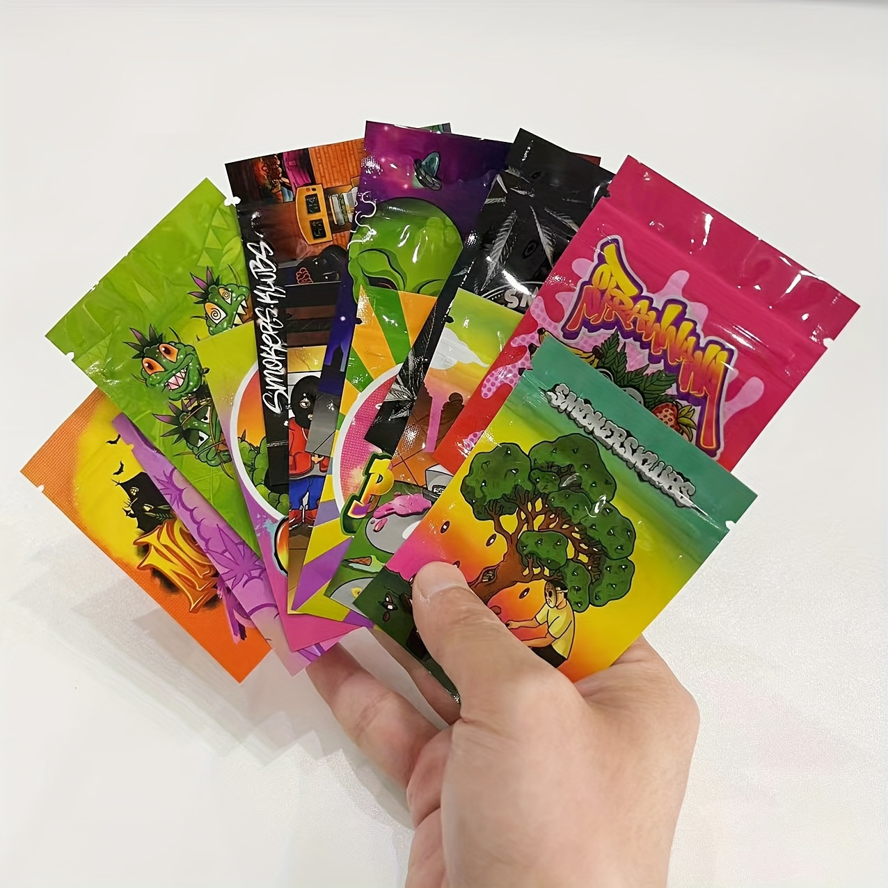 Image of 100pcs Vibrant Printed Design Mylar Bags - 7x10cm, Reusable & Smell-proof Plastic Packaging Pouches With Window, Colorful Foil Mylar Bags For Small Items Storage, Pouch Bags, 1g Sachet