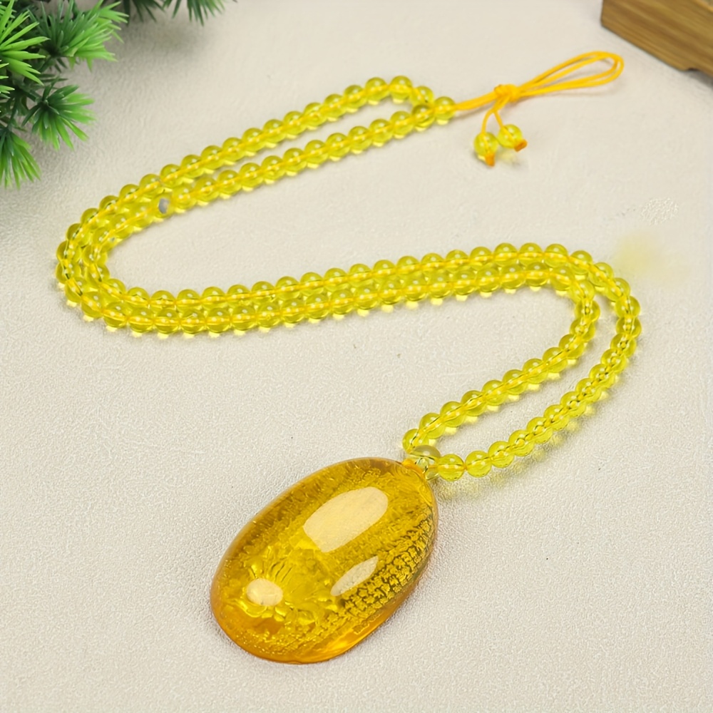 Natural Amber Carved Lotus Sutra Pendant, Unisex Gift