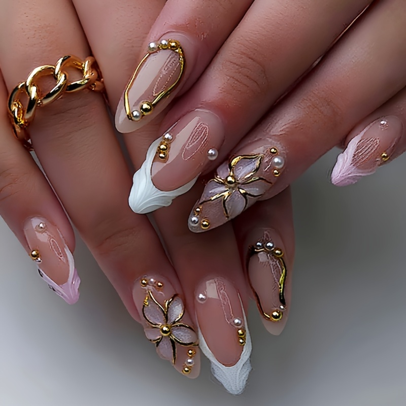 set of 24 almond shaped press on nails featuring floral and golden embellishments   women and for parties dates festivals or everyday use