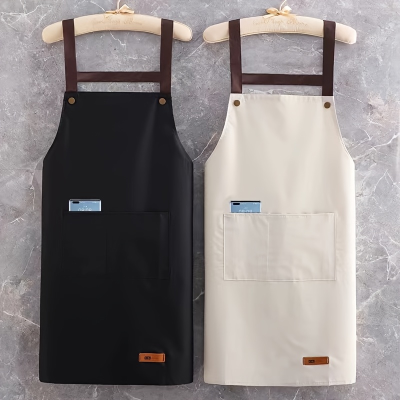 a single waterproof and oil resistant apron for home use with a large pocket 0