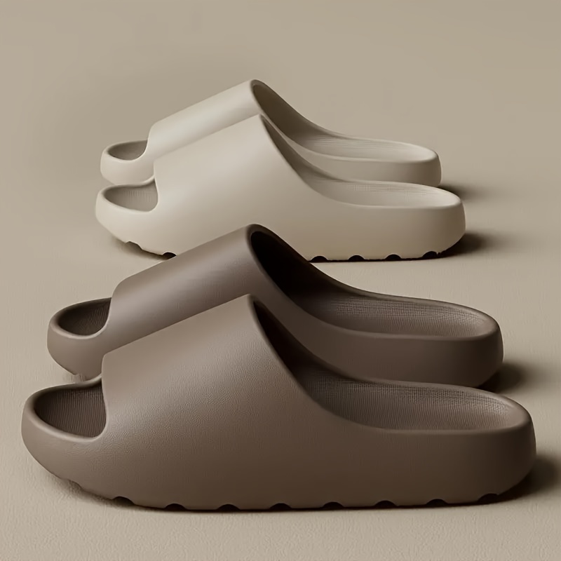 

Chaussons EVA - Pantoufles Confortables pour Intérieur/Extérieur en Blanc, et Foncé avec Design Texturé Antidérapant, Chaussures Ouvertes Élégantes pour Toutes les , Chaussons de Maison