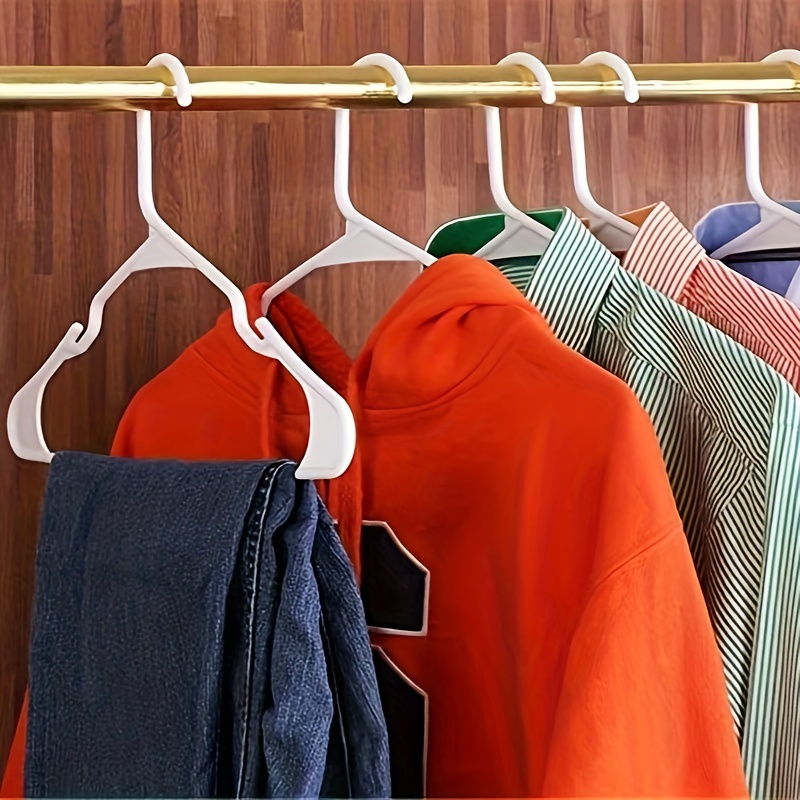 

Set Of 50 White Durable Plastic Hangers For Adults And Teens