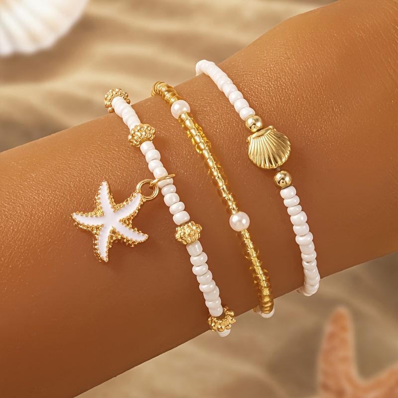 Image of A Set Of 3 Bohemian Bead Bracelets Featuring Summer Like Starfish And Shell Charms, Perfect For Women To Wear At Daily Parties And Beach Vacations