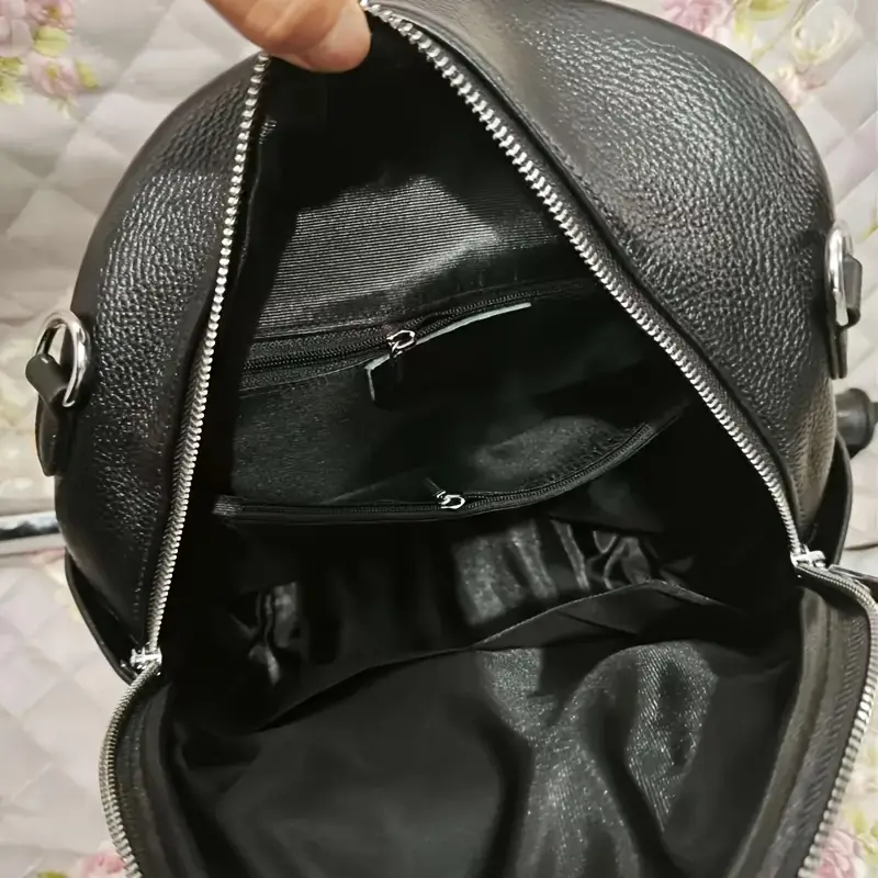 designer black leather backpack silver zippers Stylish Vintage shaped zip opens to a spacious Black Lambskin Leather Backpack: Studded