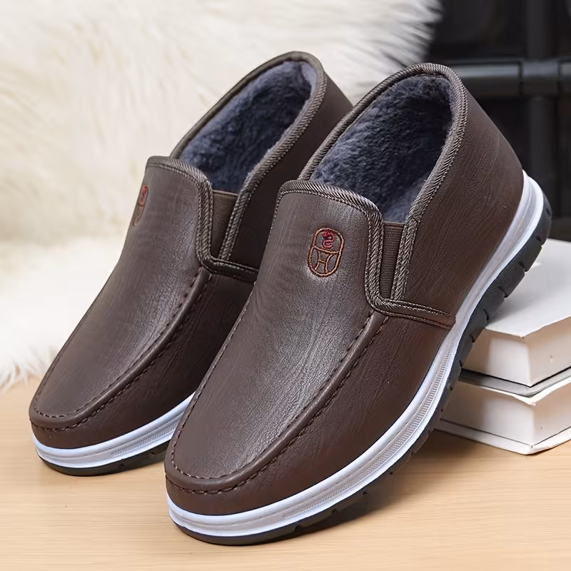 mens winter boots slip on ankle boots with a flat design black insulated footwear featuring thickened warm lining low heeled round toe non slip solid color minimalist style outdoor pvc sole hiking shoes Product details 9