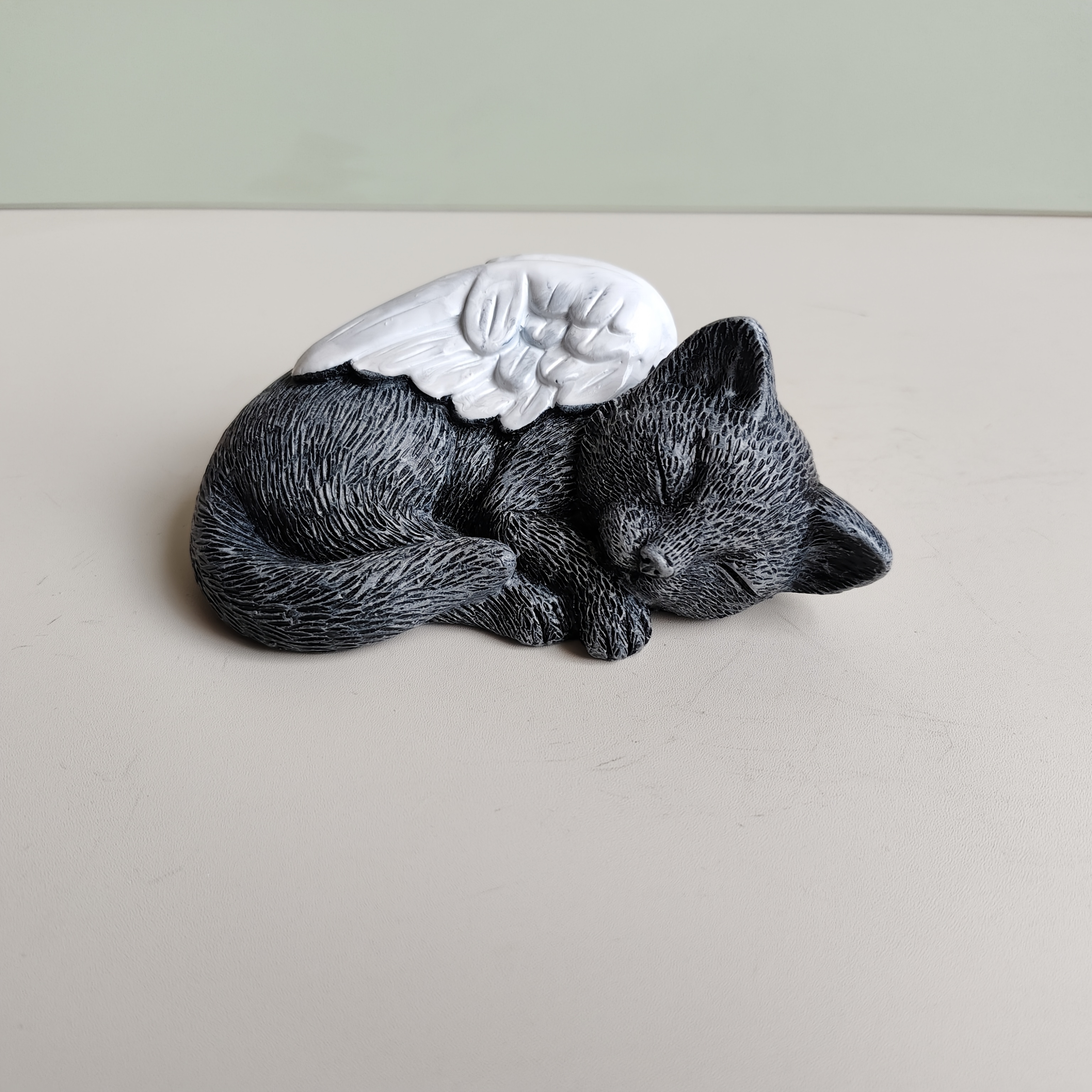 Image of A Resin Statue Of A Gray Cat And A Black Cat With Wings, Perfect For Decorating Your For Home Or Garden, Serving As A Memorial For A Pet Cat, And As A Decorative Tombstone For Animals
