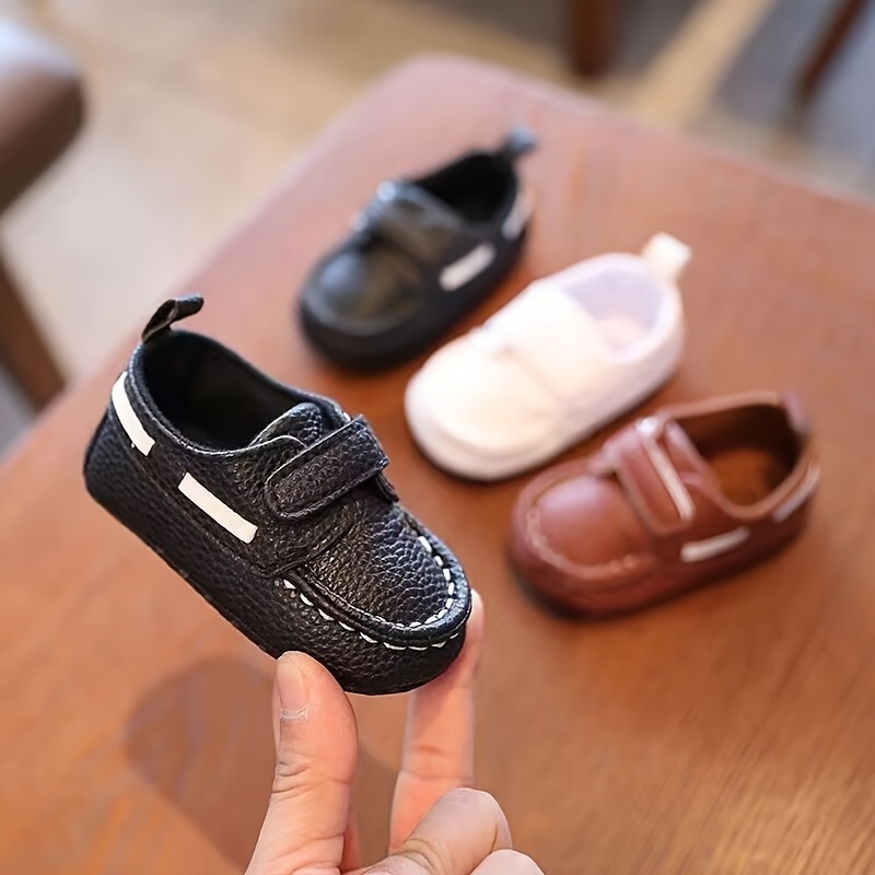 b8c58d21-0b0d-4207-939c-ef1b31ffccd0.jpg Toddler Boys Girls First Walkers Closure Casual Shoes - Breathable PU Upper & Fabric Sole, Low-Top Black/White Sneakers for Indoor Outdoor Walking, Newborn Baby Shoes with Easy On/Off Design, Kid Shoes, Newborn Footwear, Stylish Kid's Shoes, Durable Infant Shoes