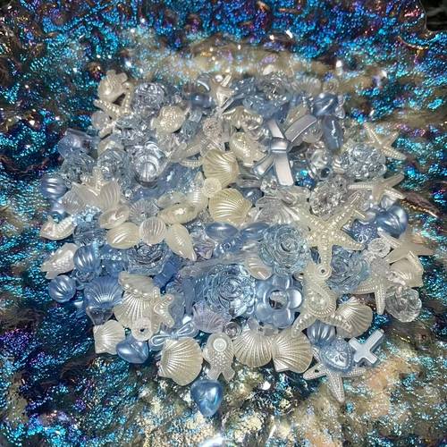 50 ocean themed beads shaped like shells conchs hearts and butterflies for crafting create irregular acrylic bead bracelets additions phone cases and ornaments and pendants