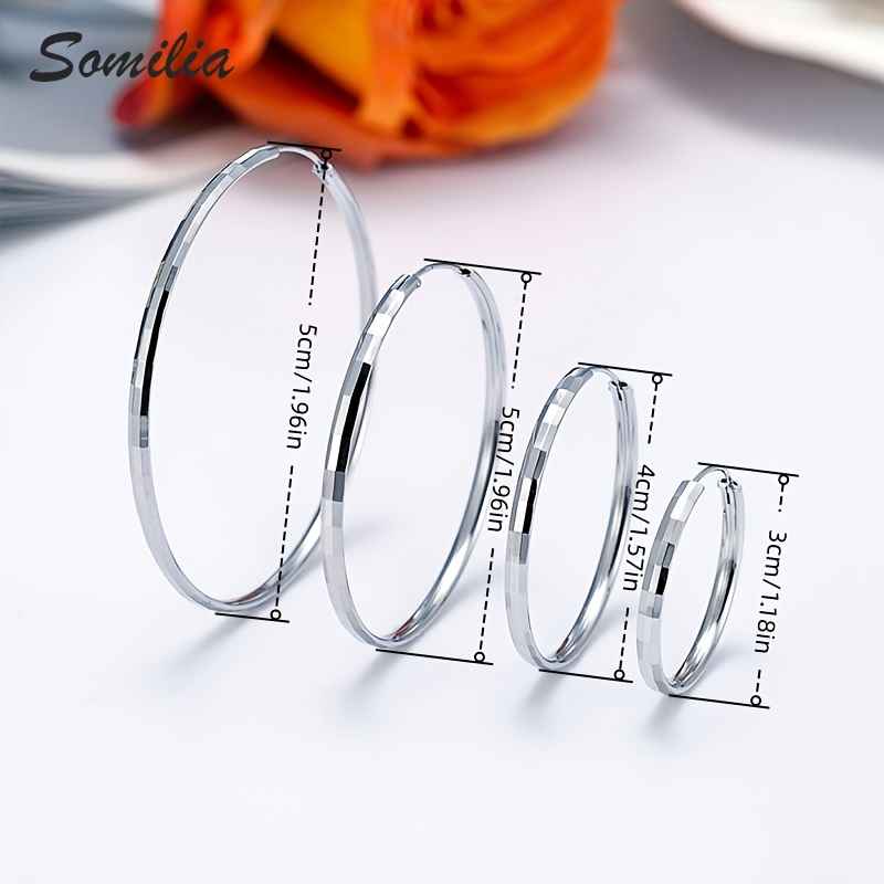 Silver Plated Circular Earrings with Geometric Patterns