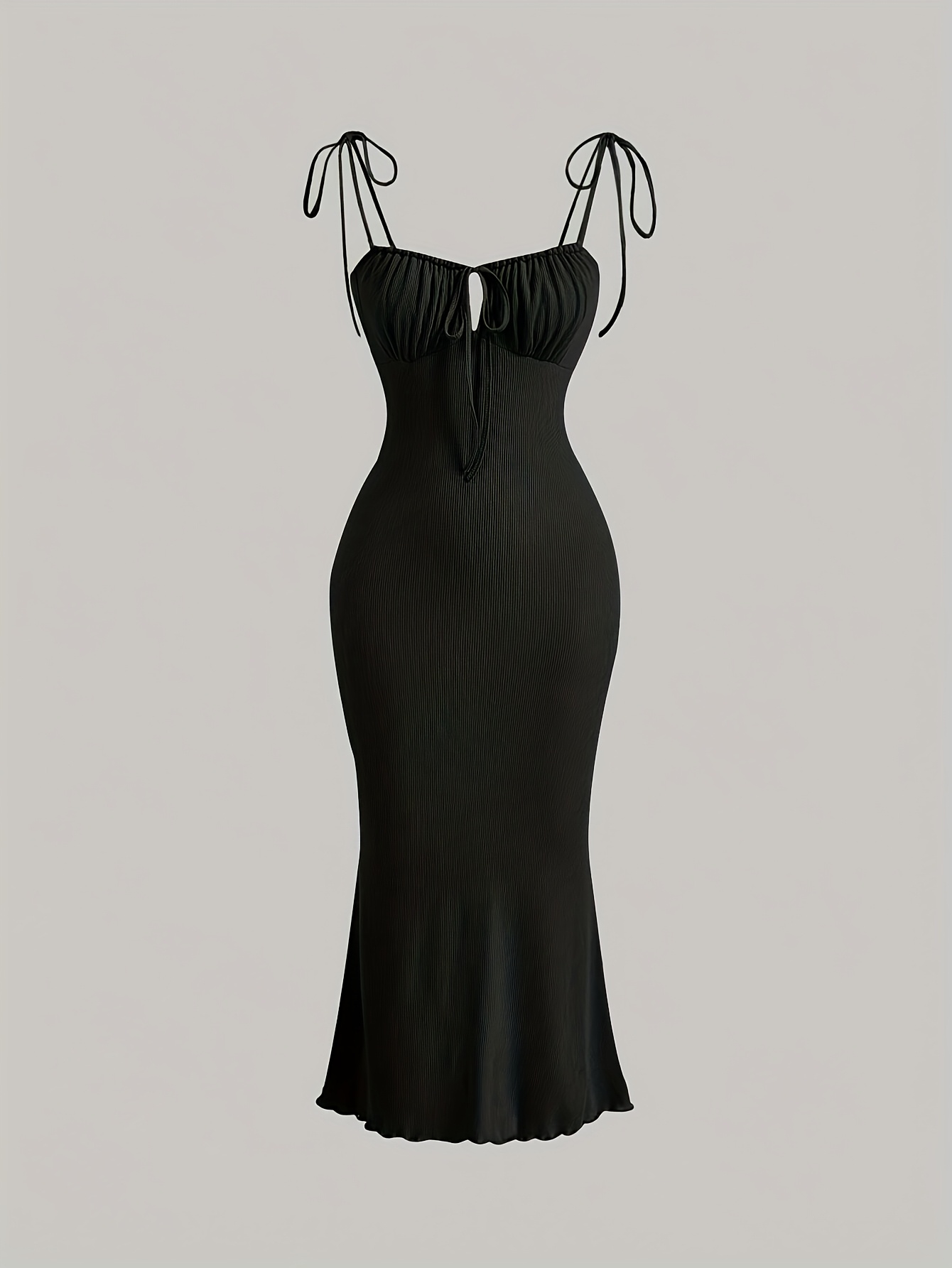 A Stylish Dress for Women Featuring Front Pleats, a Tied Chest, And Shoulder Straps