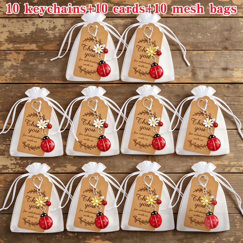 TEMU 30 pezzi/10 set - Portachiavi con ciondolo a forma di a sette con fiori intarsiati e diamanti, (10 portachiavi + 10 biglietti + 10 sacchetti a