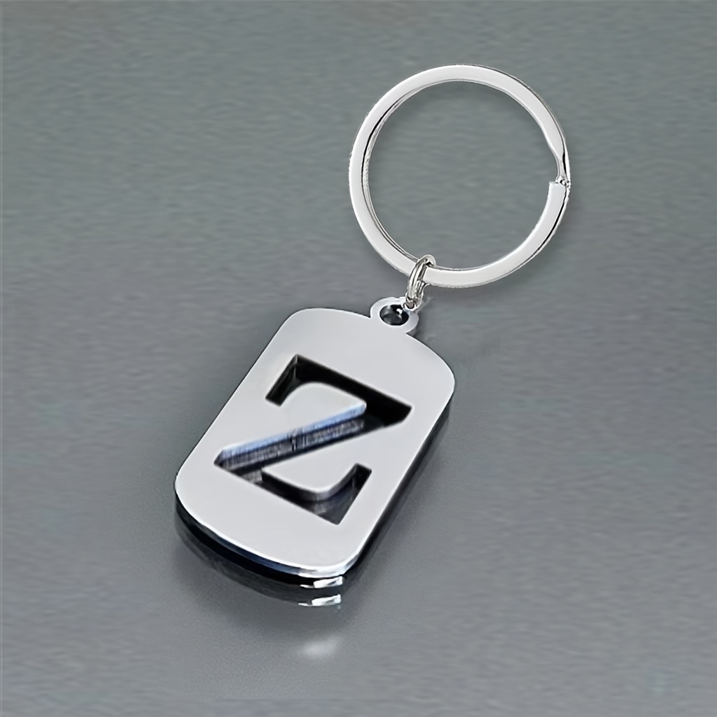 изображение предмета мужской брелок из нержавеющей стали с буквами - минималистичный     жетона, буквы 26,   для рюкзаков и автомобильных аксессуаров | смелый шрифт | жетон из нержавеющей стали