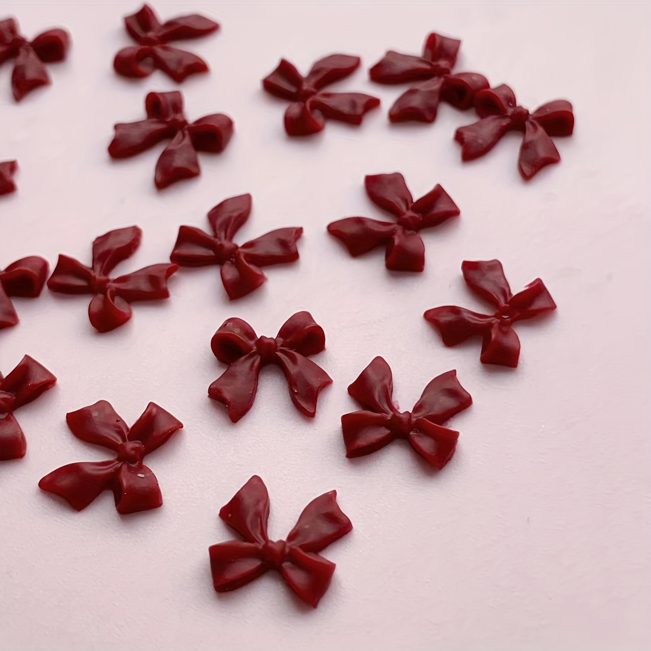 Image of 50pcs Wine Bow Nail Charms - Glossy Diy Nail Art Decorations For Autumn & Winter, Manicured Hands, Nail Art Supplies