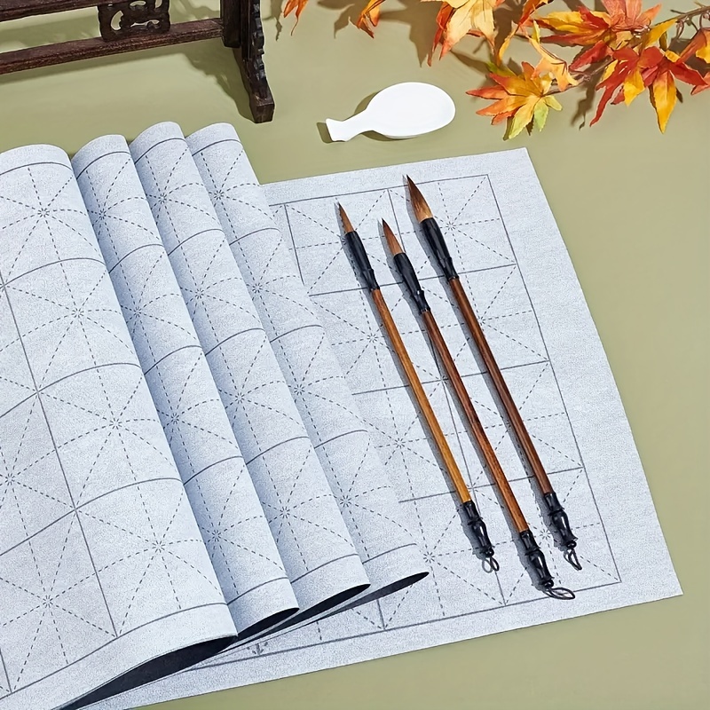 

A 12pcs Calligraphy Kit Featuring Reusable Water Cloth, Traditional Brushes, And A Water Dish, Ideal For Beginners To Practice.