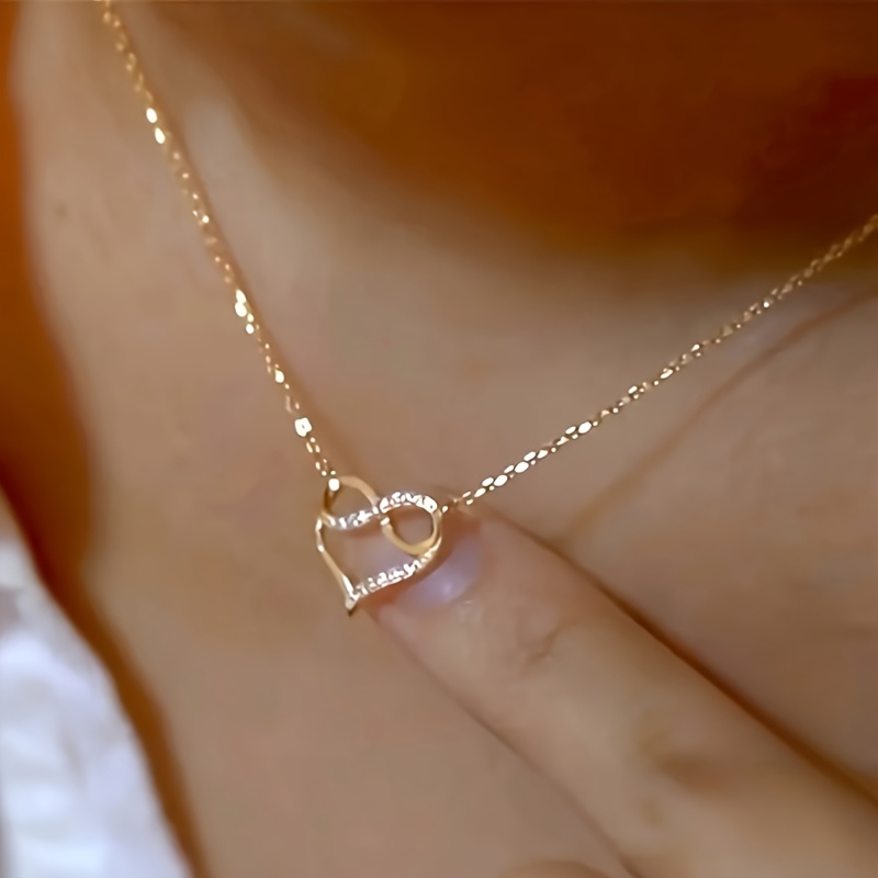 

A Stylish Pendant Necklace For Women With A Heart-shaped Infinity Pendant Set With Synthetic Zirconia, Proposing, Engagement, Wedding, Or As A Valentine's Day Gift To Express Love Through Jewelry.