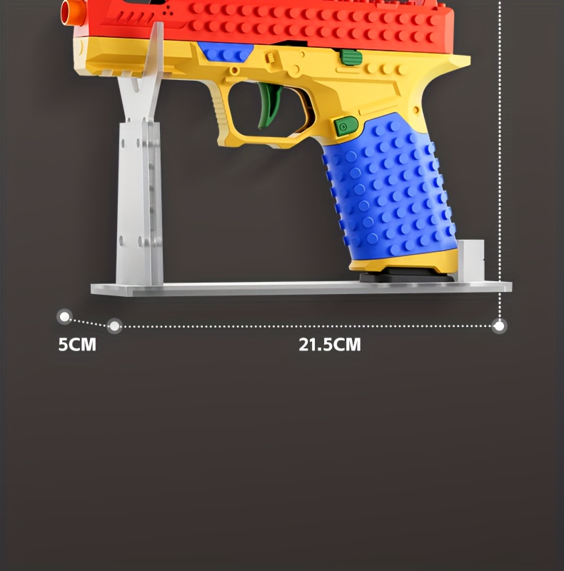an   model of a building block gun featuring a realistic   system this safe and non toxic stem toy requires no batteries and   in a vibrant red yellow and blue color scheme making it   christmas birthdays Product details 7