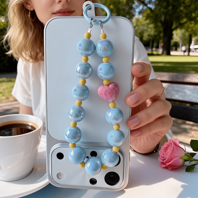 TEMU 1 pièce Breloque de téléphone perlée irisée , Dragonne de cœur à couleurs contrastées, Accessoire de téléphone -perte