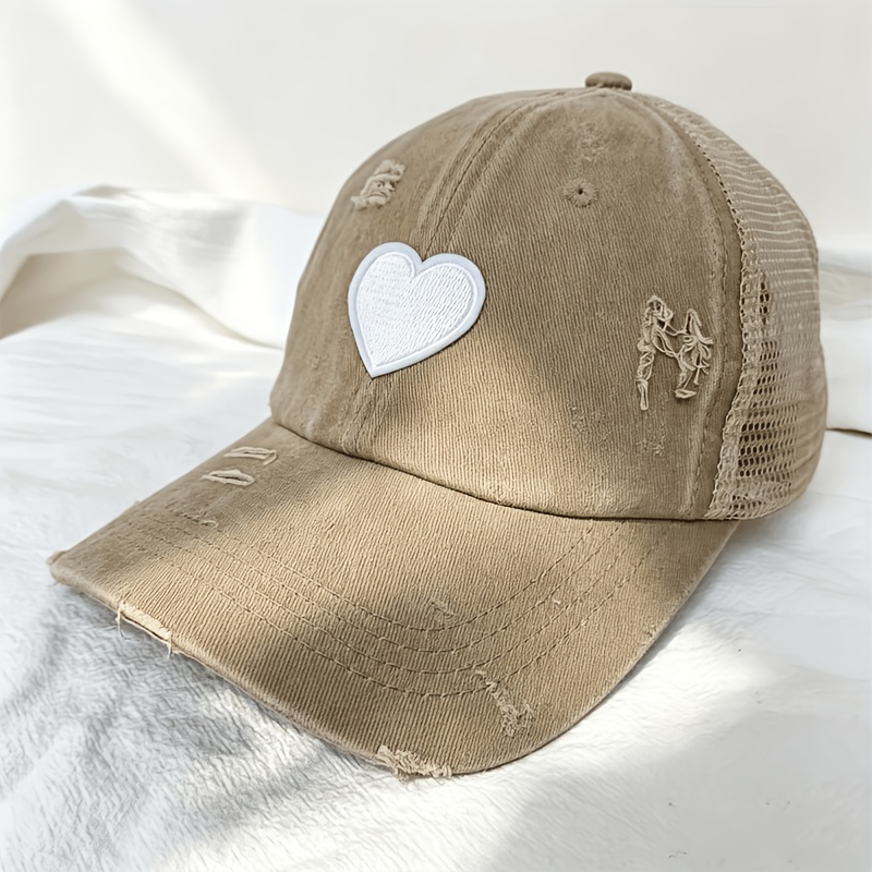 Image of Adjustable Women's Baseball Cap With Ponytail Hole, Vintage Black Mesh Trucker Hat With Heart Embroidery And White Stitching Details, Embroidered Baseball Cap