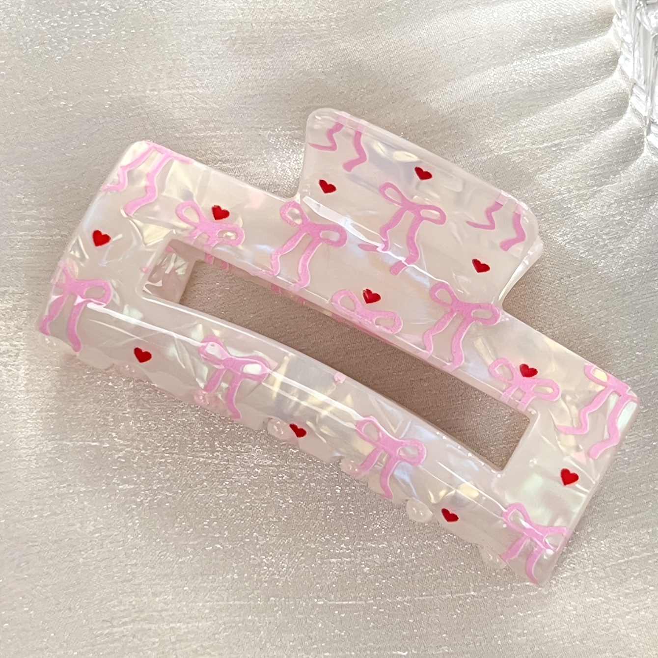 Image of Pink Heart Bow Patterned Iridescent Hair Claw Clip With A Strong Acrylic Grip, Perfect For Cute ' Hairstyles