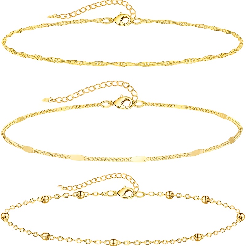 Image of A Set Of 3 Elegant And Stylish Golden Ankle Bracelets For Women, Perfect For Casual Parties And Vacations, Worn Alone Or Stacked