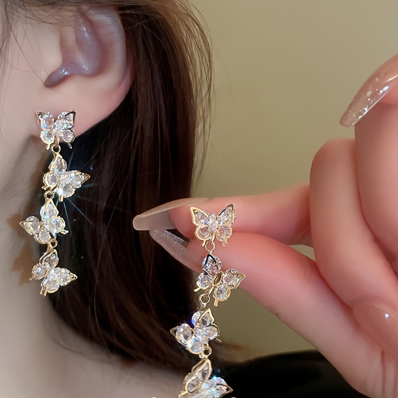 

A Pair Of Design Light Luxury Zirconia Butterfly Tassel Earrings