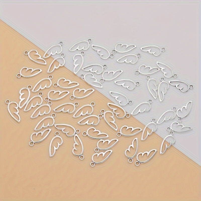 Image of 50pcs Hollow Wings Wing Charm Alloy Hollow Wings Wing Ancient Silvery Tibetan Silvery Making Bracelet Diy Earrings Necklace Hollow Wings Pendant Handmade