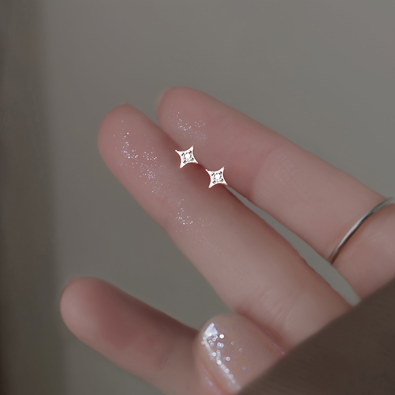 TEMU Un par de aretes de estrella de puntas para mujeres, con un estilo moderno, elegante. Diseño único y artesanía , ideales para a día y citas