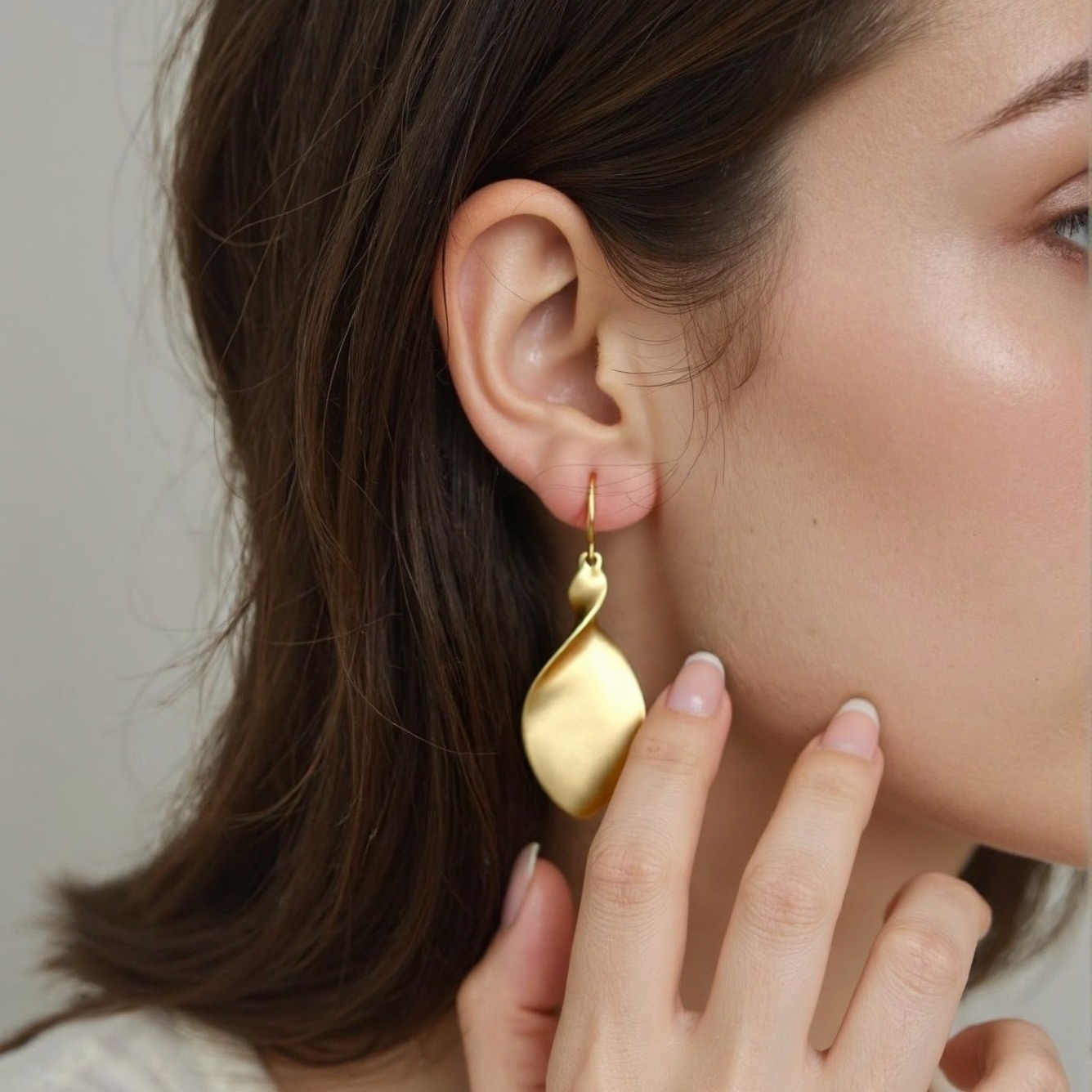 Image of A Pair Of Elegant Gold-tone Drop Earrings With -dimensional, Stylish, And , Perfect For Daily Wear Or Gifting For Evening Events