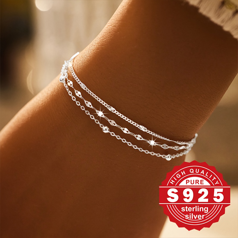 

A Women'-layer Bracelet Made Of S925 Sterling Silver, Featuring Of Different Styles Of Chains. Yet Stylish, , Suitable For Wear, And Has A Low Allergy At 2.5g.