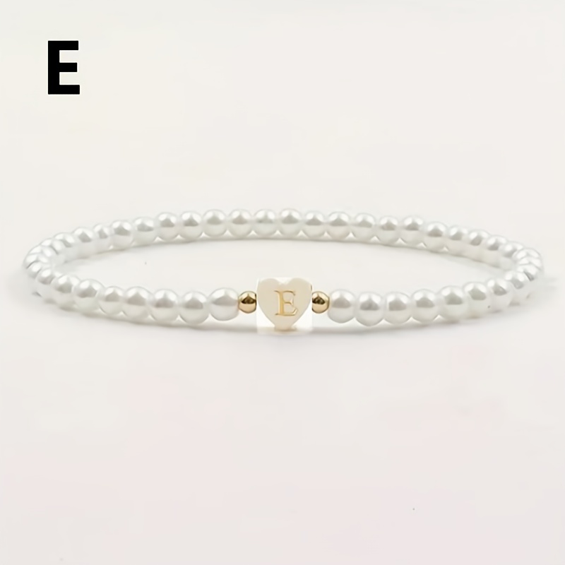 TEMU Pulsera de 1 pieza de de perla falsa con 26 dijes de alfabeto A-Z de cara, estilos para combinar, pulsera de moda para mujer, cordón elástico,