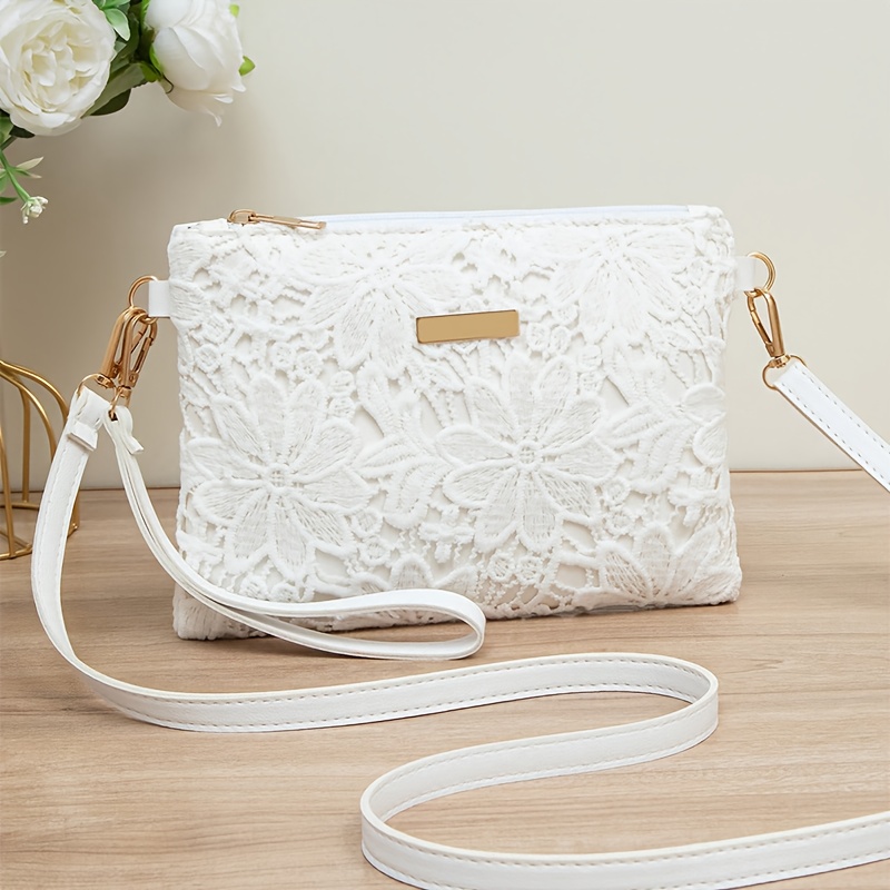 E-shop Eine stylische Blumen-Schultertasche, für Freizeitaktivitäten, als Umhänge- oder Handtasche geeignet. Es ist ein hochwertiges Accessoire, ideal