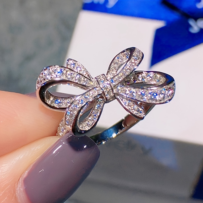 

A Stylish And Unique Lady's An And Lovely Bow Inlaid Synthetic Zirconia, Suitable For Daily Casual Parties And Banquets, A Birthday Gift For Women ( Box).