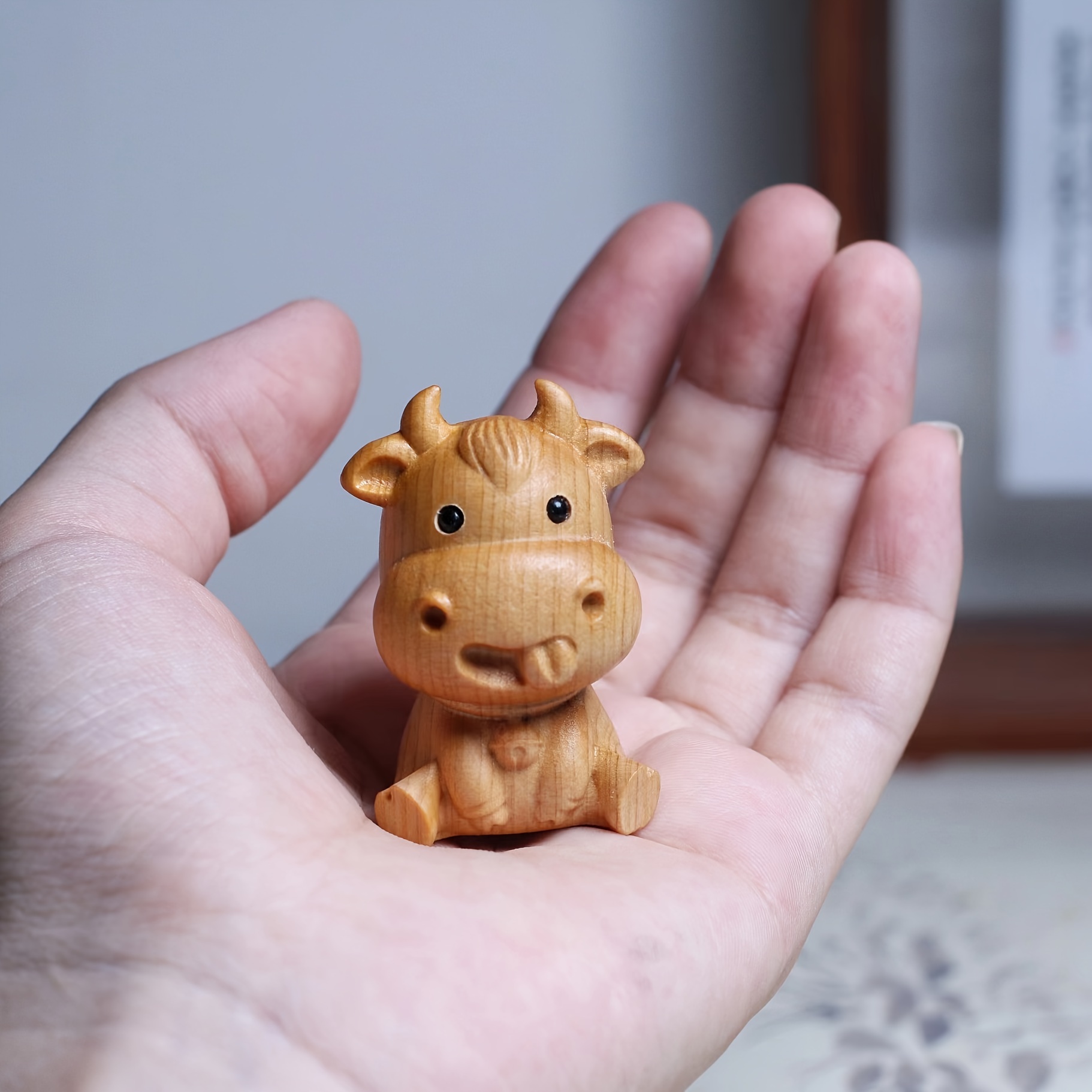 Image of A Wooden Cow Figurine, A -carved Cute Cow With A Tongue Sticking Out, Perfect As A Car Ornament Or A Christmas Decoration
