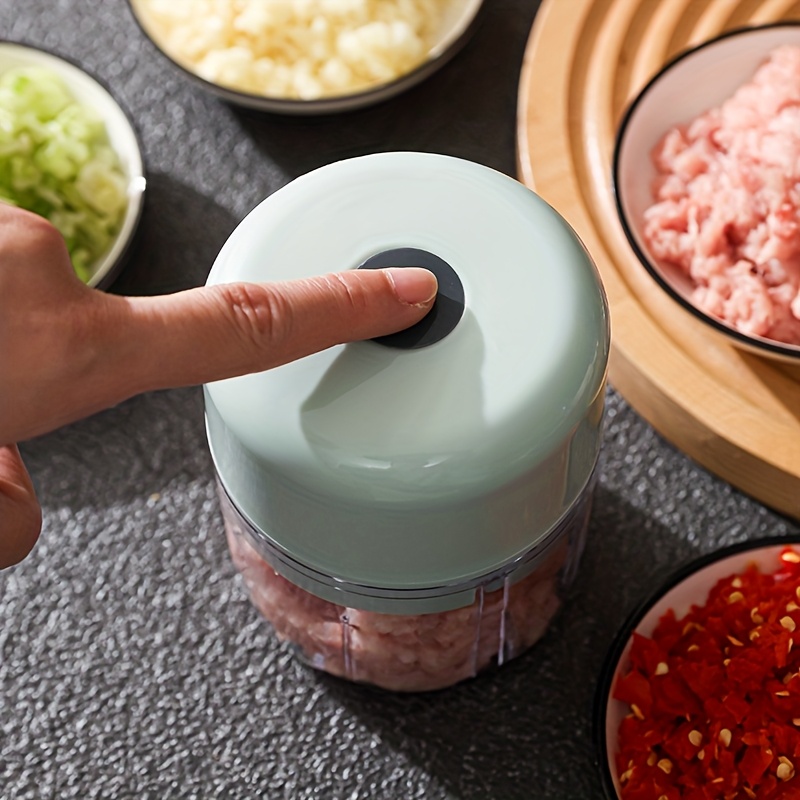 3 color options compact electric garlic press for home and restaurant use with stainless steel blades quickly crushes garlic and ginger ideal for   food preparations Product details 0