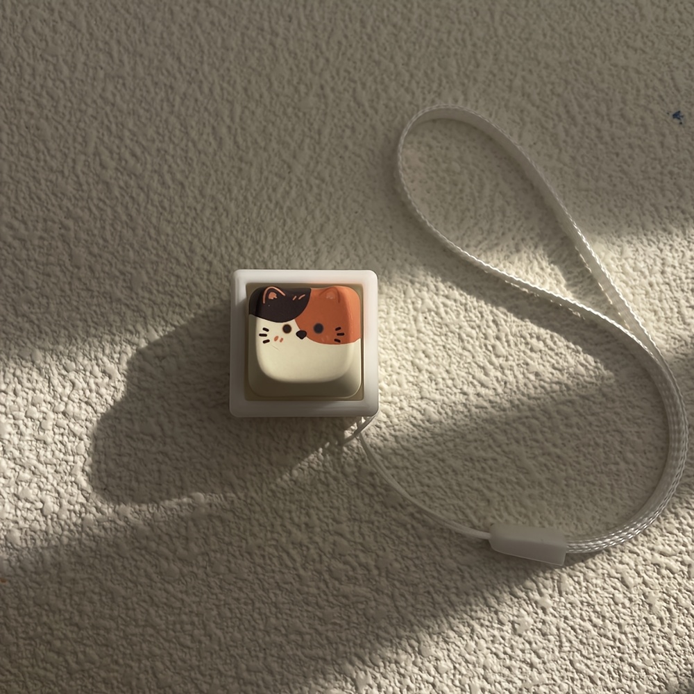Image of A Calming Cat Keycap Stress-relief Button Featuring A Calico . Easy To Press, Portable And Compact, It You Relax And Makes A Great Gift For