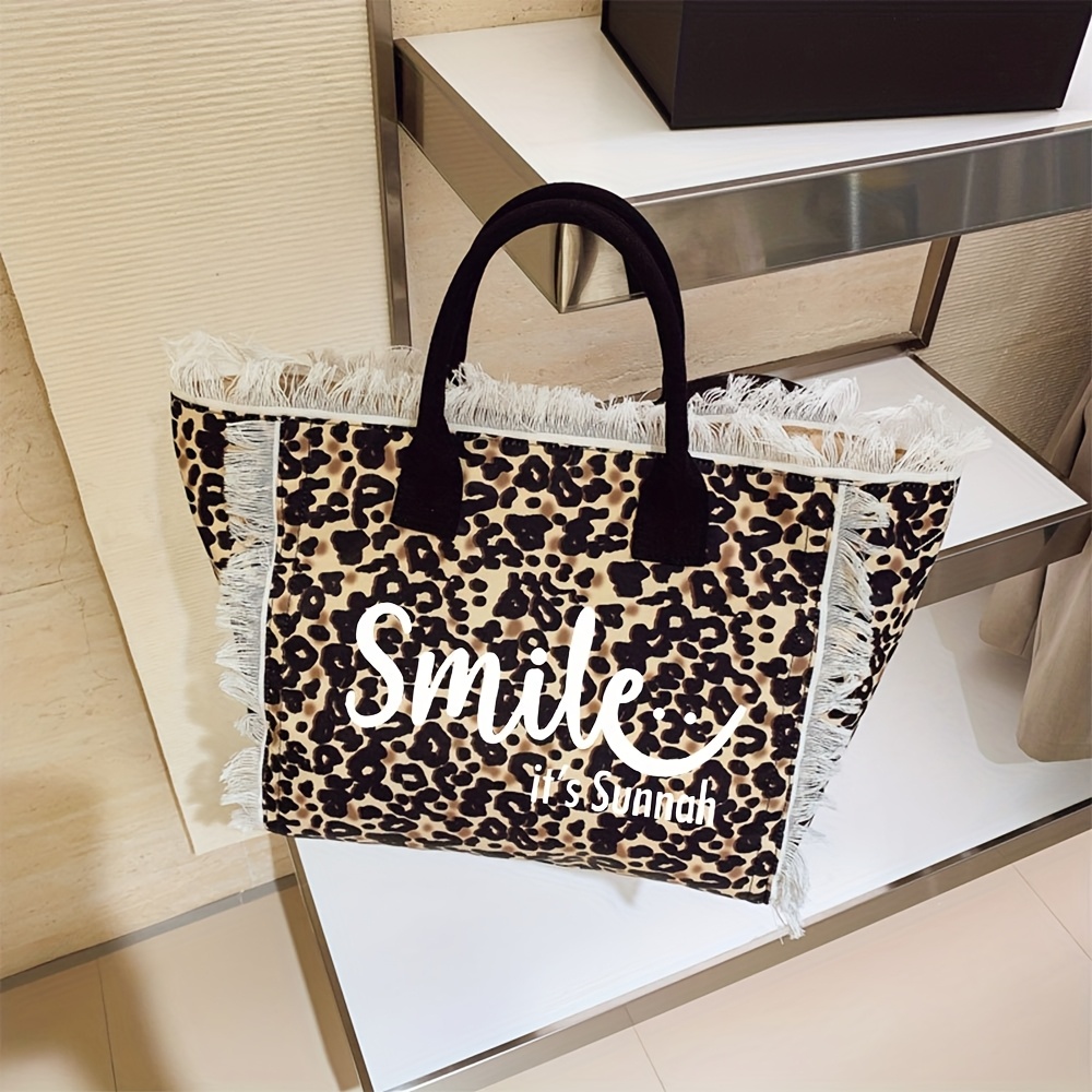 Image of Fashion Women's Leopard Print Handbag Canvas Large Capacity Individual Smiling Print Convenient Temperament Style Single Shoulder Handbag
