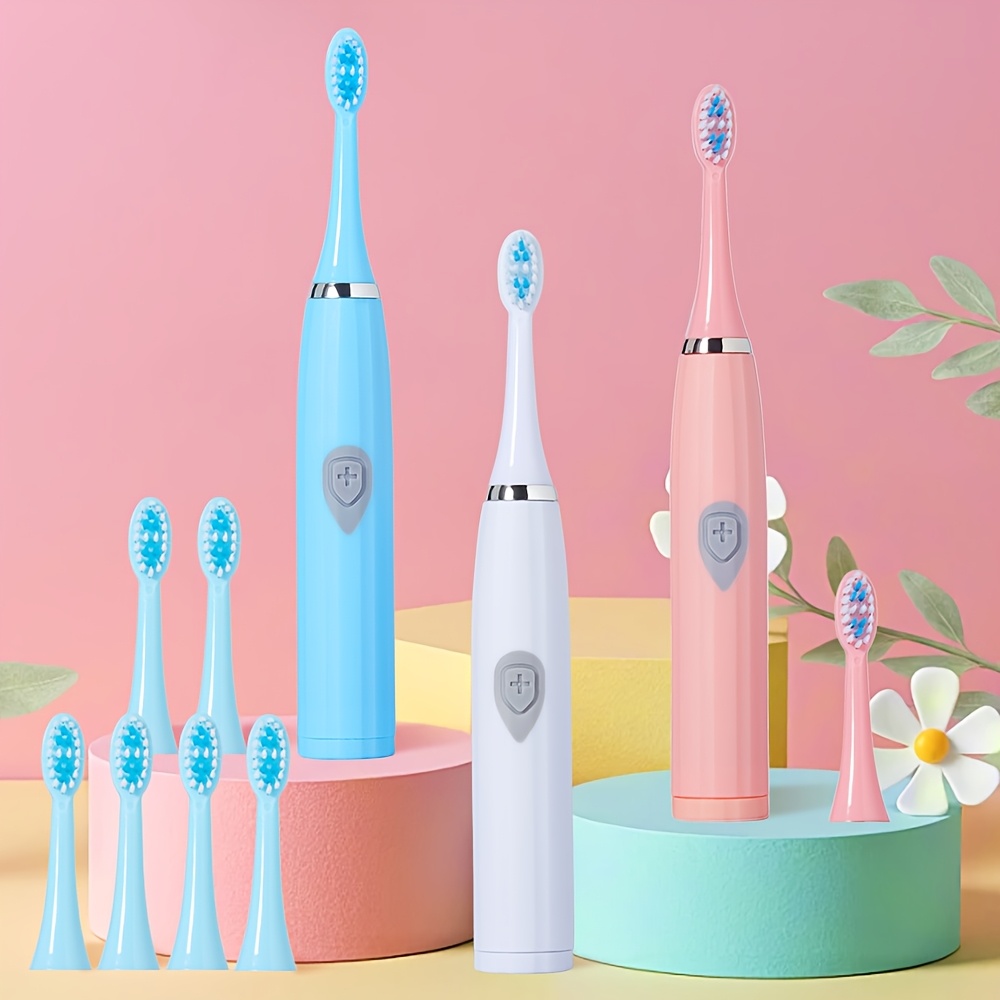 Travel-Friendly Electric Toothbrush with Interchangeable Brush Heads