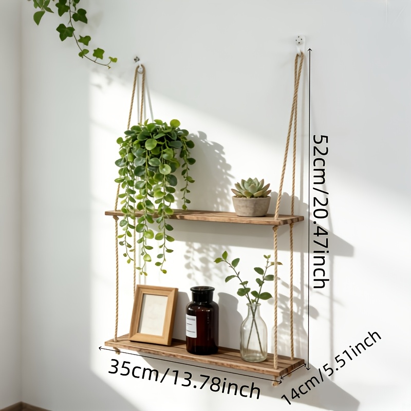 E-shop Eine doppelstöckige Wandregal aus Holz im Bohemian-Stil, hergestellt mit Hanfseil, ideal zur Aufbewahrung von Pflanzen in Wohn- und