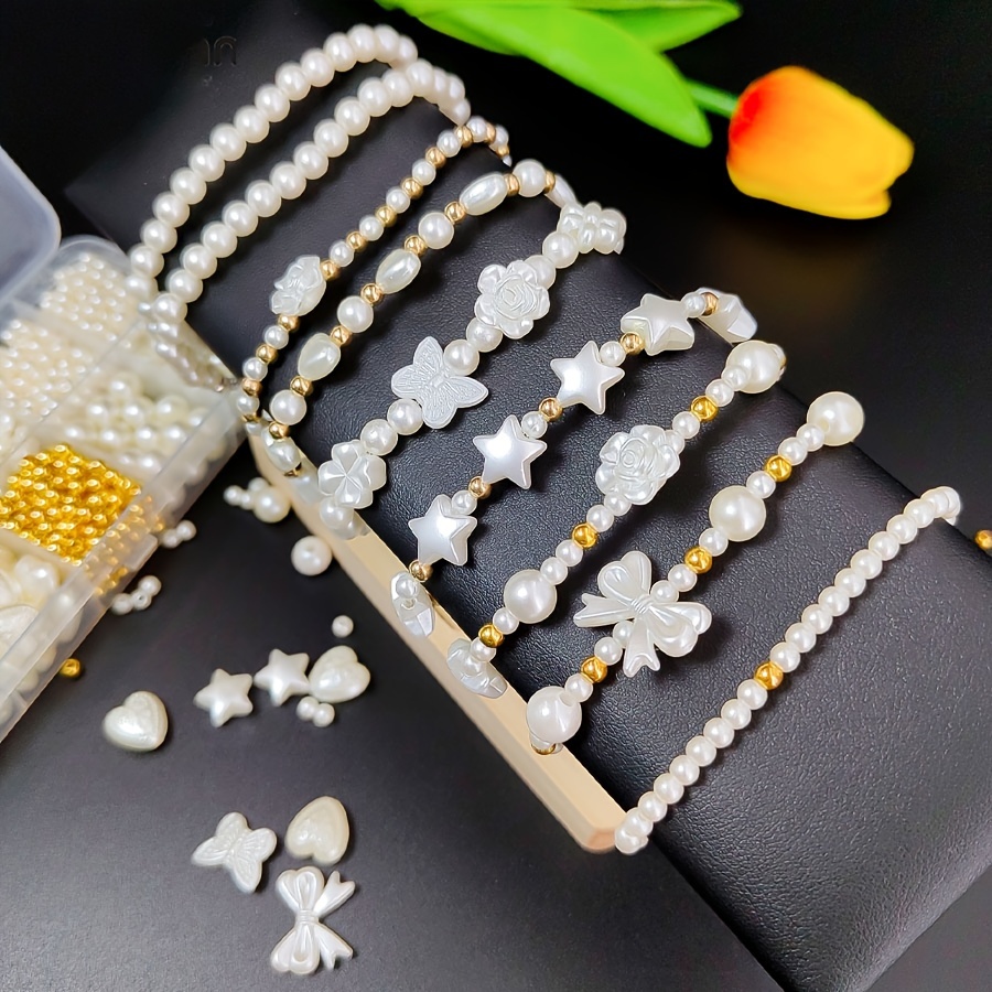 

1 Pack Elegant Style 10-grid Diy Bracelet Beading Kit, White Glossy Beads & Mixed Charms Jewelry Making Supplies, Handcrafted Charm Bracelets Materials Set
