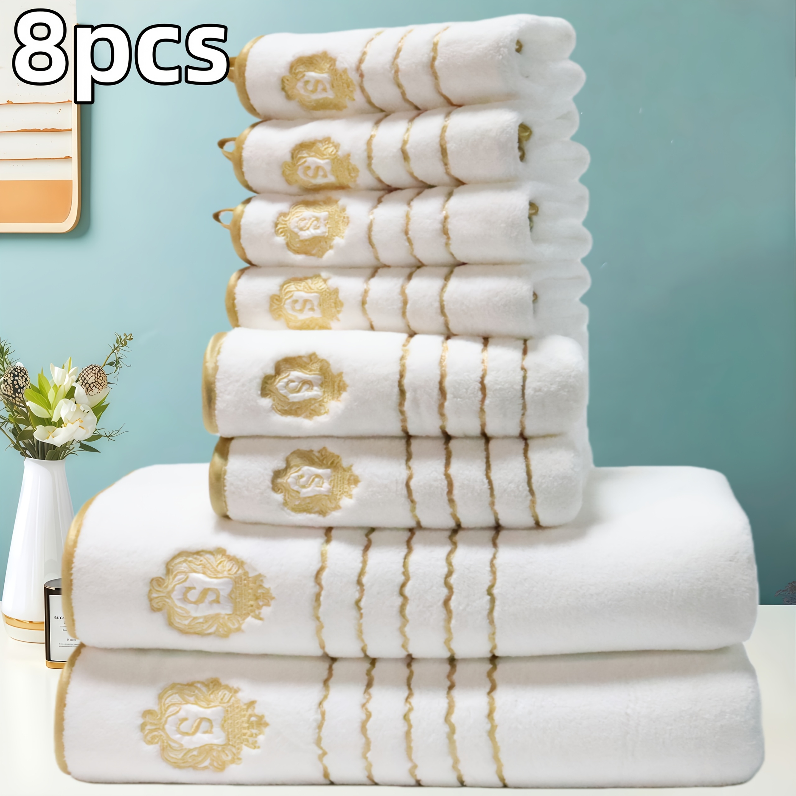 E-shop 8-teiliges Set mit 2 Handtüchern, 2 Badetüchern und 4 Quadrat-Tüchern mit einem Gewicht von 300 Gsm. Mit Kronenstickerei und goldenem Band, in