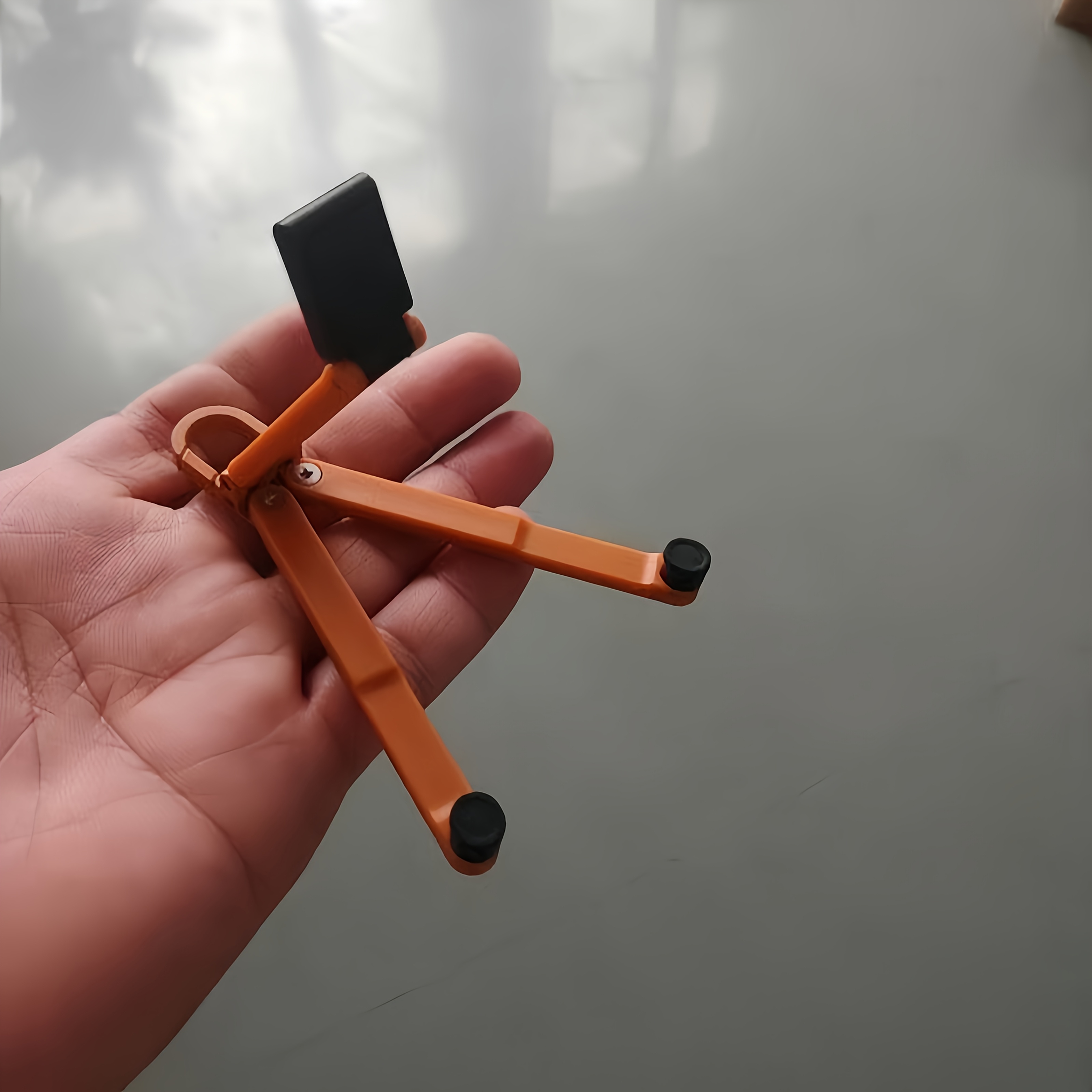 TEMU Support de téléphone portable mini pliable porte-clés avec crochet à ressort, support de voyage portable compatible avec iPhone et tous les