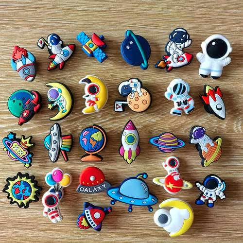 a set of 26 shoe ornaments featuring and made from pvc slippers and as gifts in assorted designs