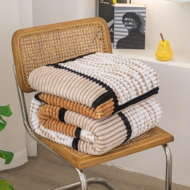 a magical fluffy striped blanket with printed   made of fleece   the office or a nap details 9