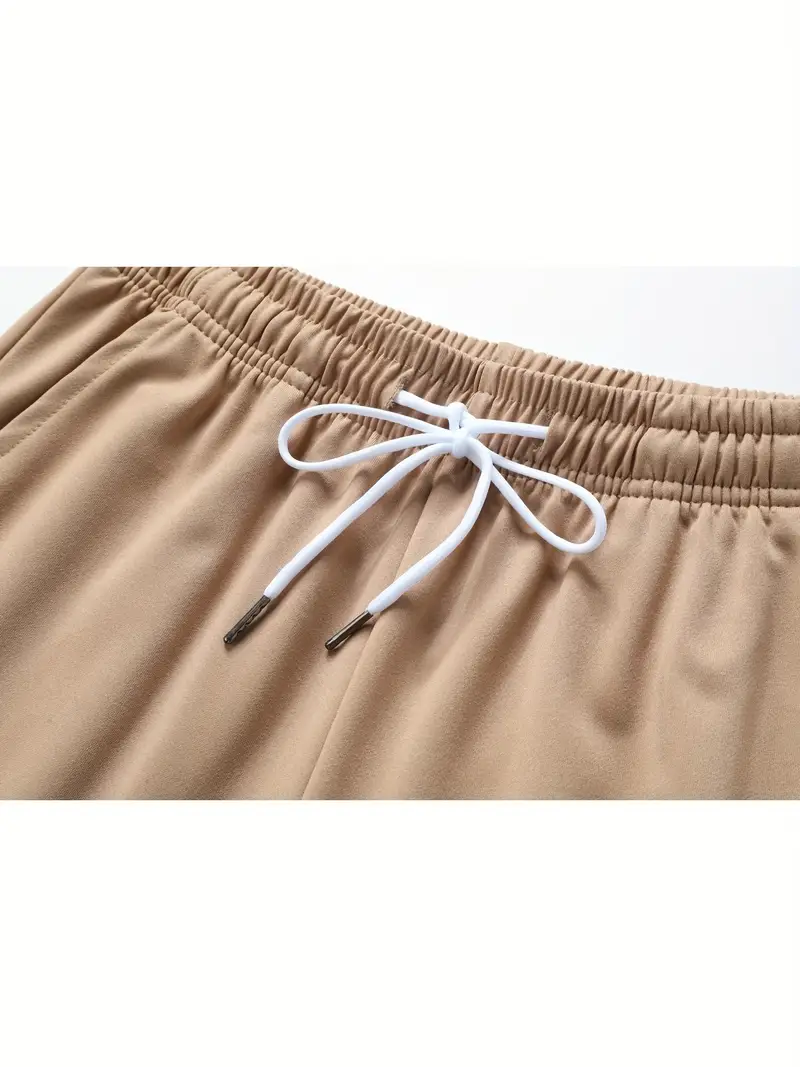 pantalon taille haute pour femme avec ceinture à cordon, tissu élastique, poches latérales et design froncé pour le camping et le port - noir, extérieur | pantalon à ceinture froncée | pantalon en tissu extensible Détails du produit 6