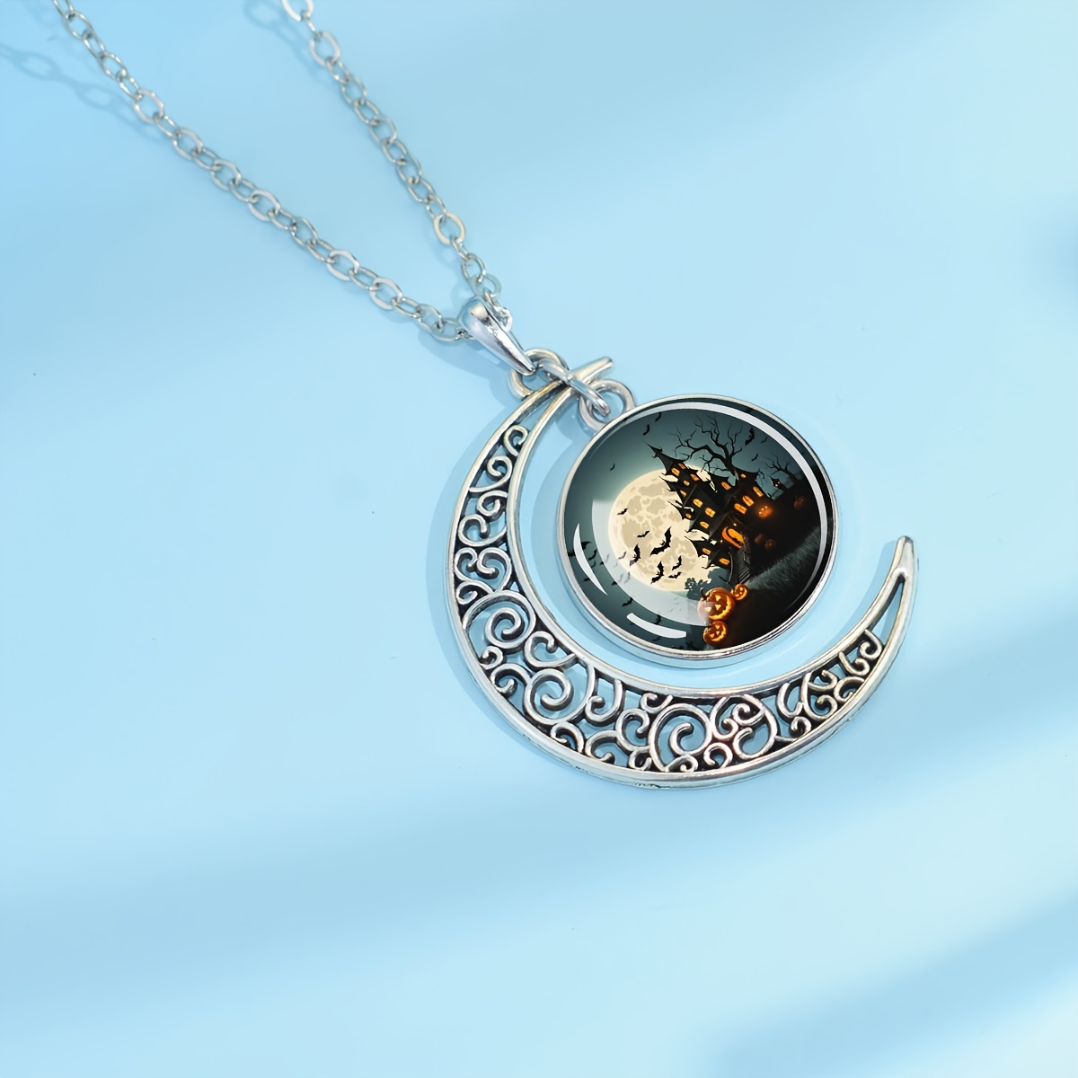 Hollowed-Out Crescent Moon Necklace with Haunted House Pendant