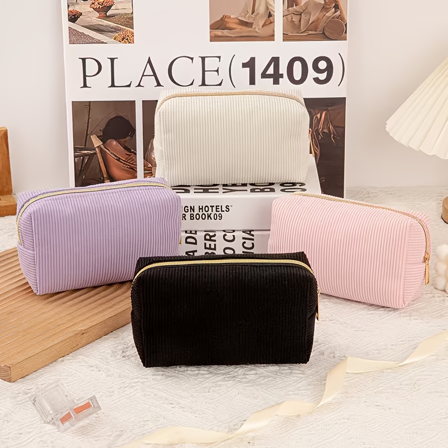 travel accessories suitable for trips featuring a new style of large opening storage bag a fashionable makeup pouch for women and a   toiletry bag for school supplies