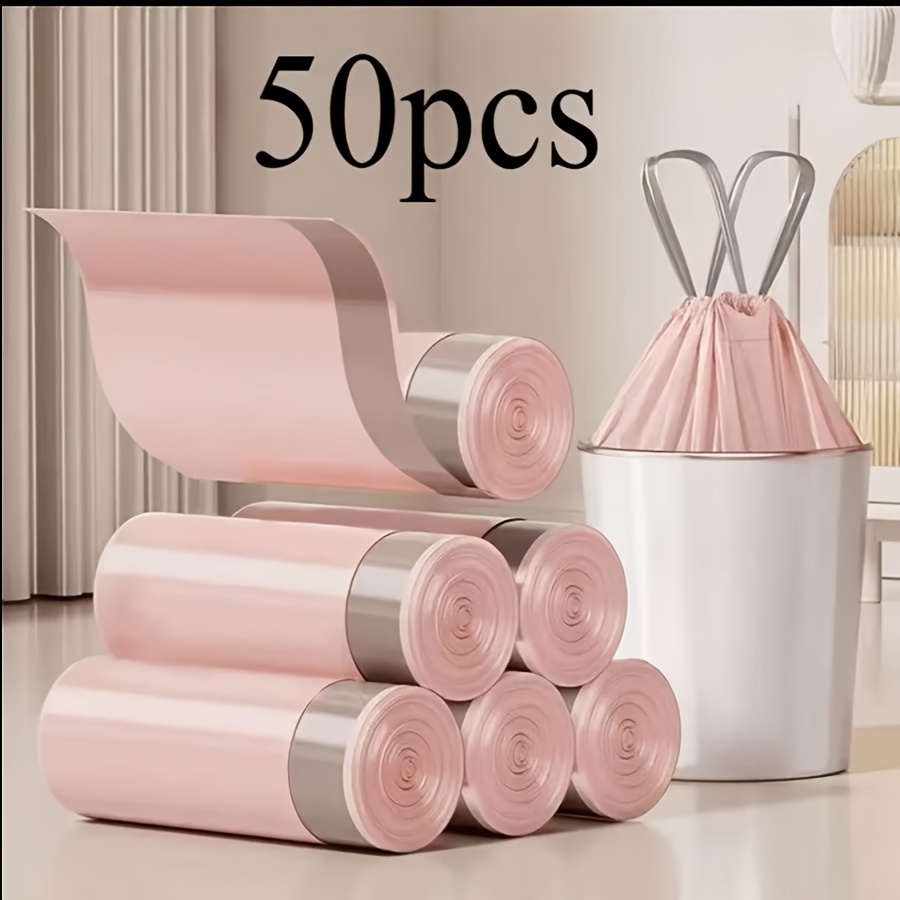 1 roll 50pcs of pink drawstring trash bags 13 gallon light purple trash bags durable leak proof tear resistant quick drawstring design   thickened plastic trash bags suitable for lining kitchen bathroom and office trash cans