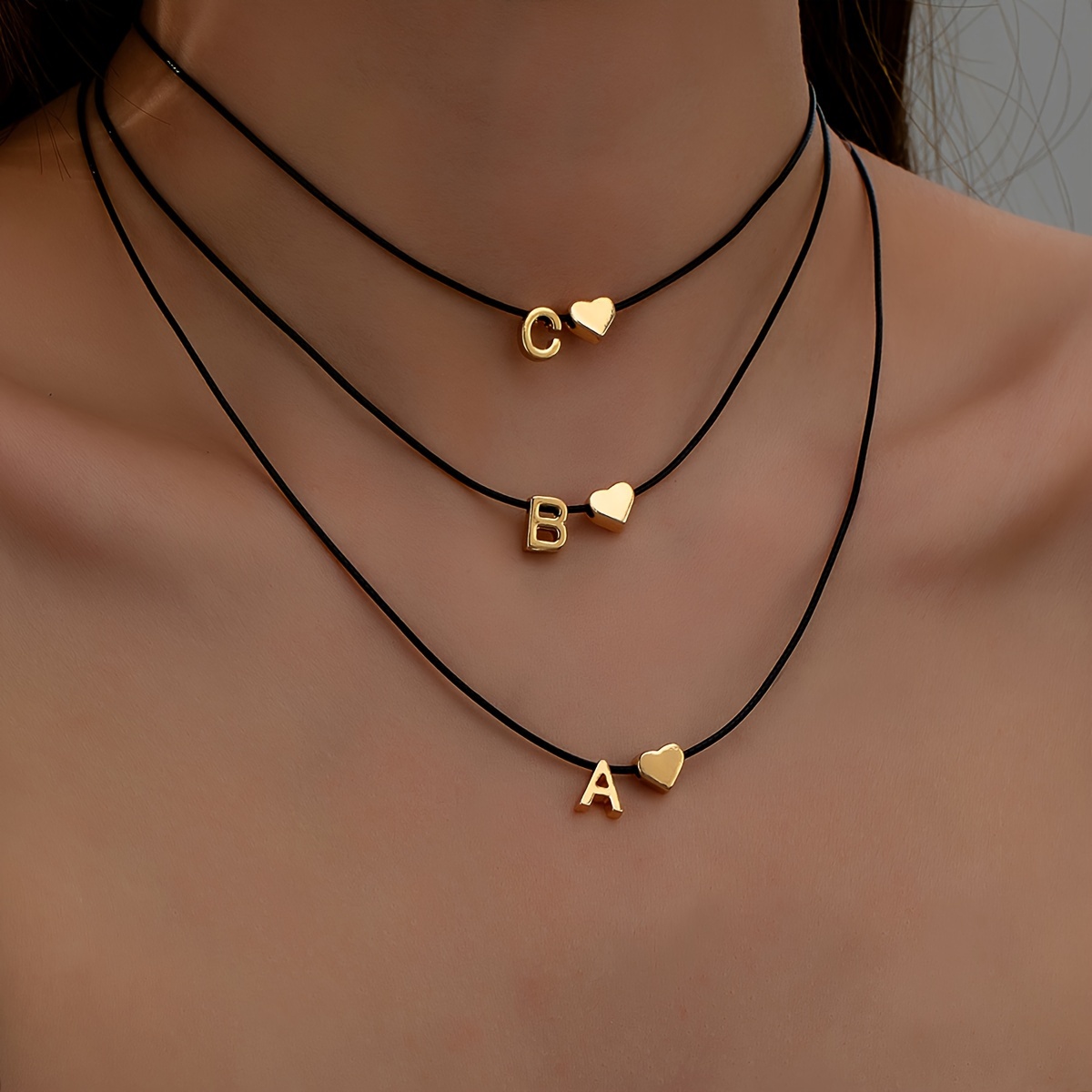 

Simple And Versatile Adjustable Necklace With 26 Letters, Black Tassel Pendant, Synthetic Fiber Cord, Suitable For Daily Wear