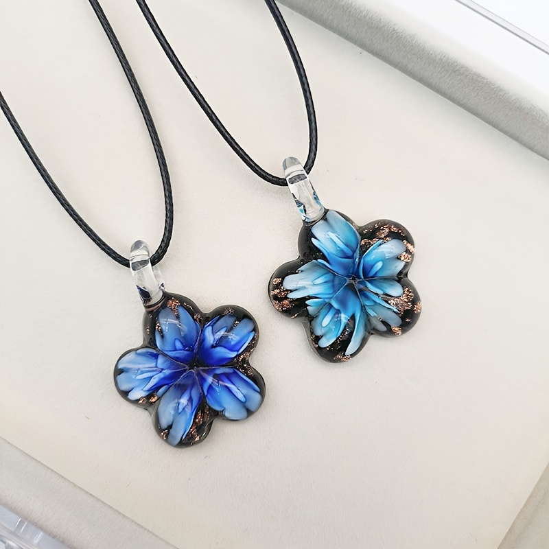 Glass Pendant Necklace on Floral Background for Daily Occasion