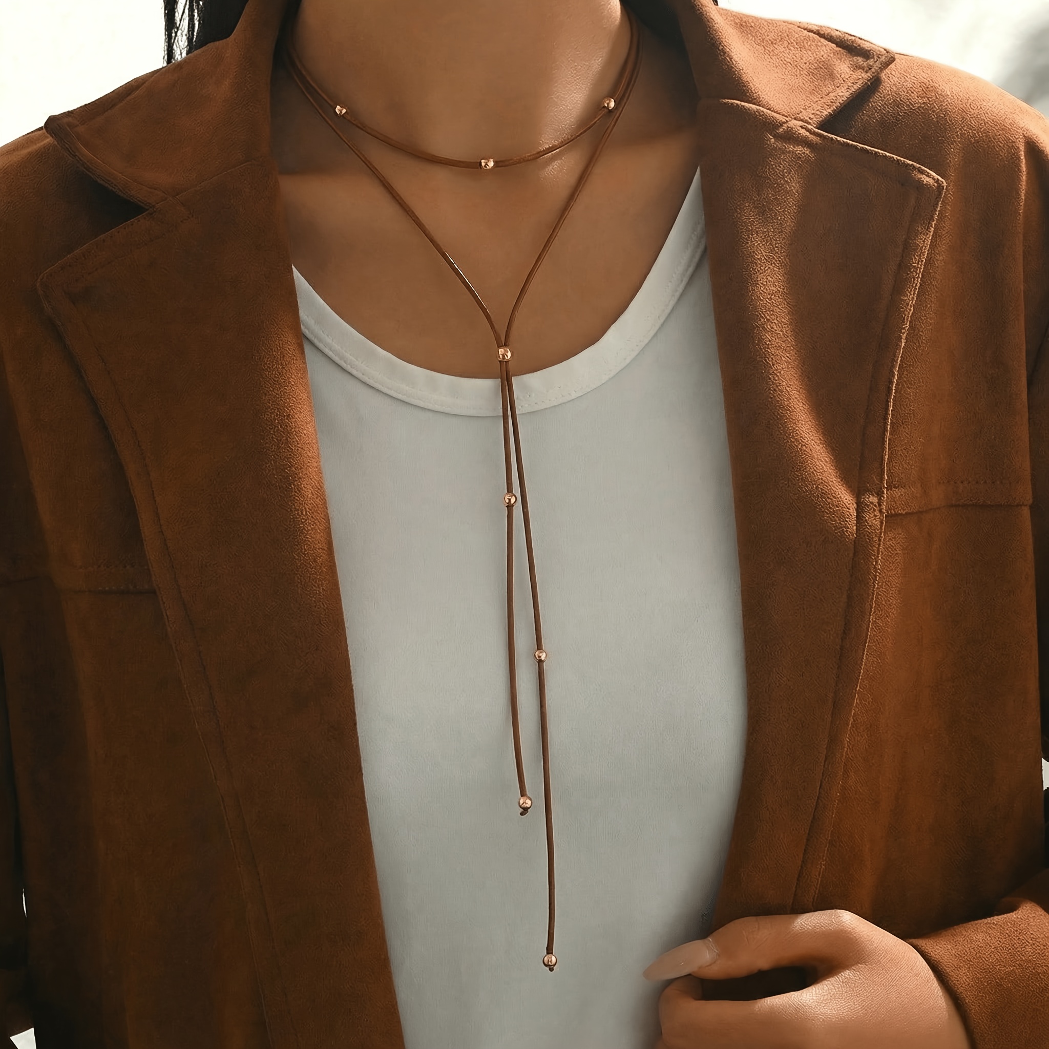 Image of A Women's Autumn And Winter Double-layer Drawstring Necklace With A Black Cord, Adjustable Length, Featuring A Delicate Texture. Suitable For Everyday Wear, Parties, Commuting, And Dates